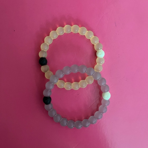 White and purple Lokai bracelets - Picture 1 of 2